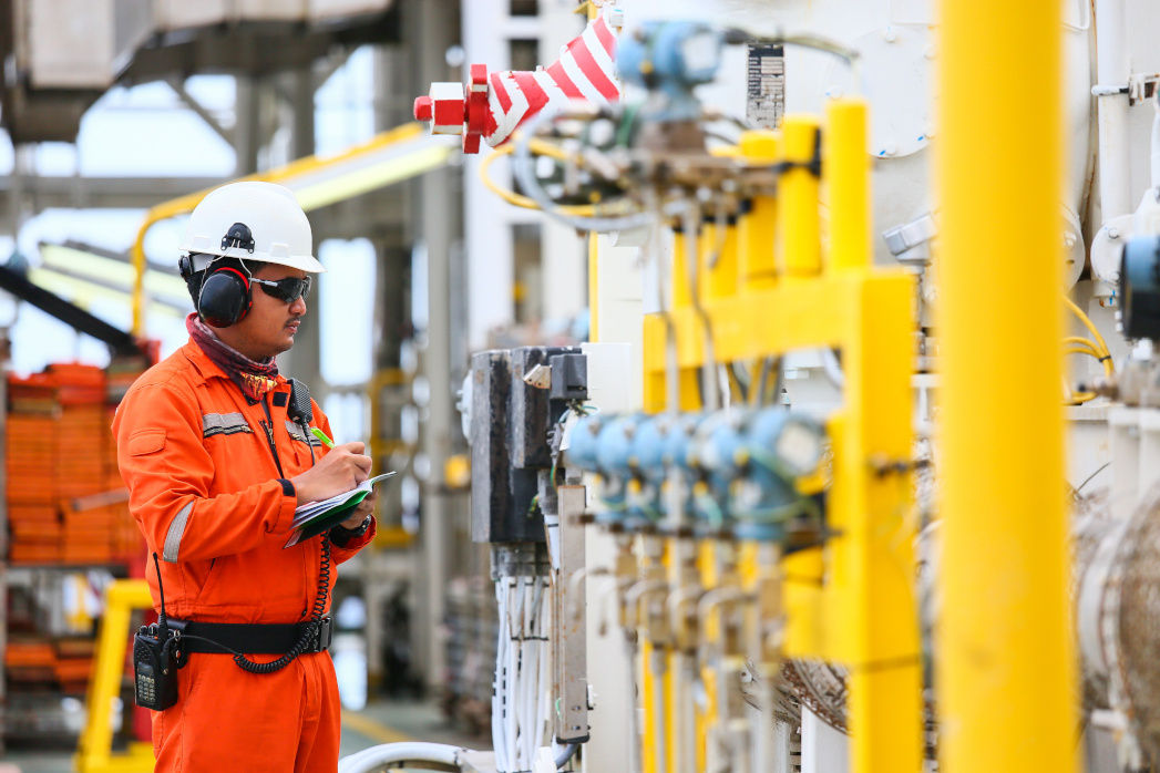 Technician checking equipment